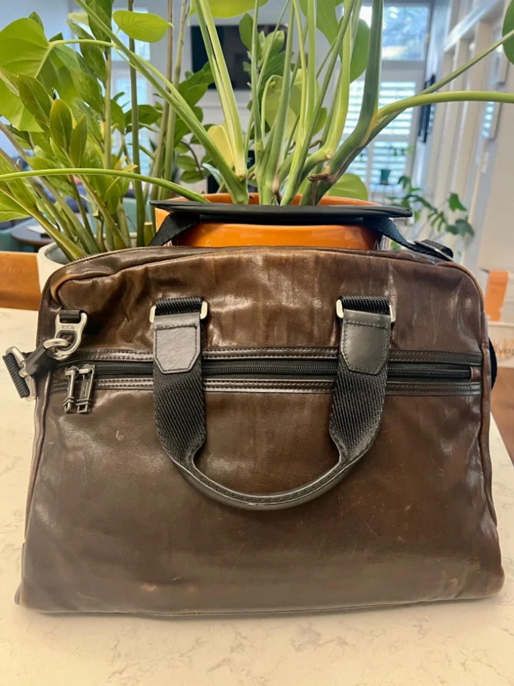 TUMI men's leather briefcase/laptop bag